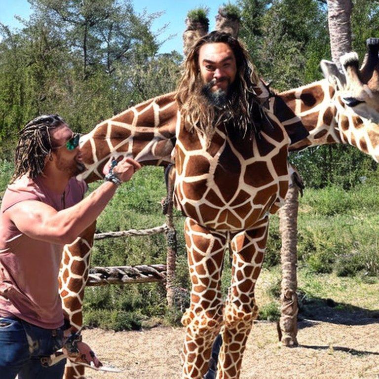 Jason Momoa Meets a Small Giraffe